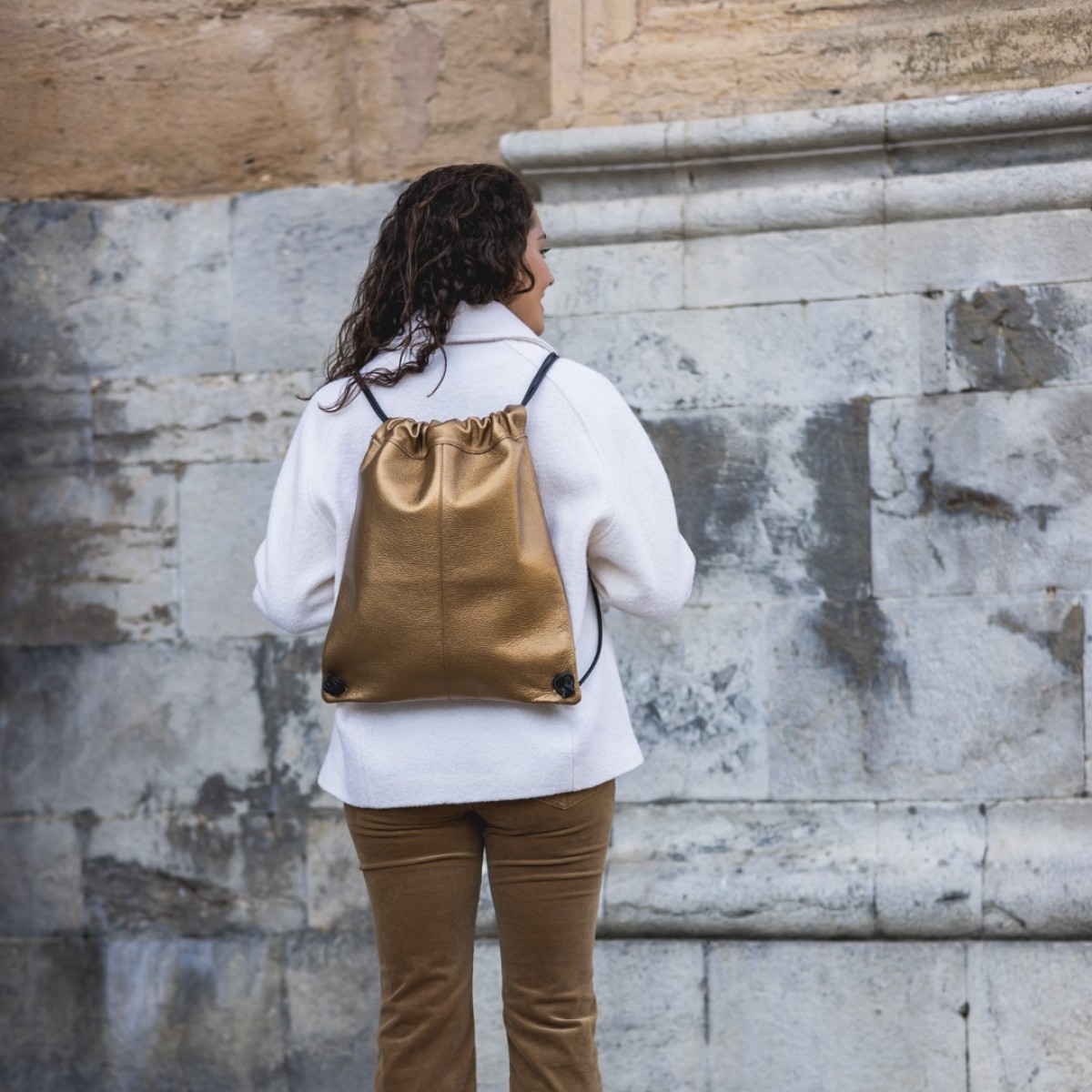 Mochila bronce unisex